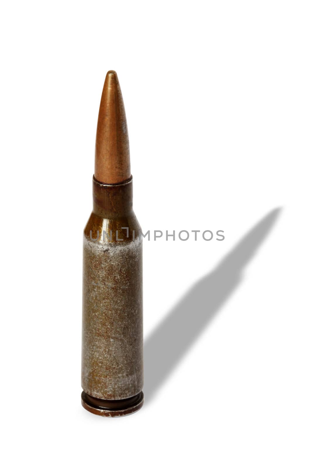 Old rifle cartridge standing on white background isolated with clipping path