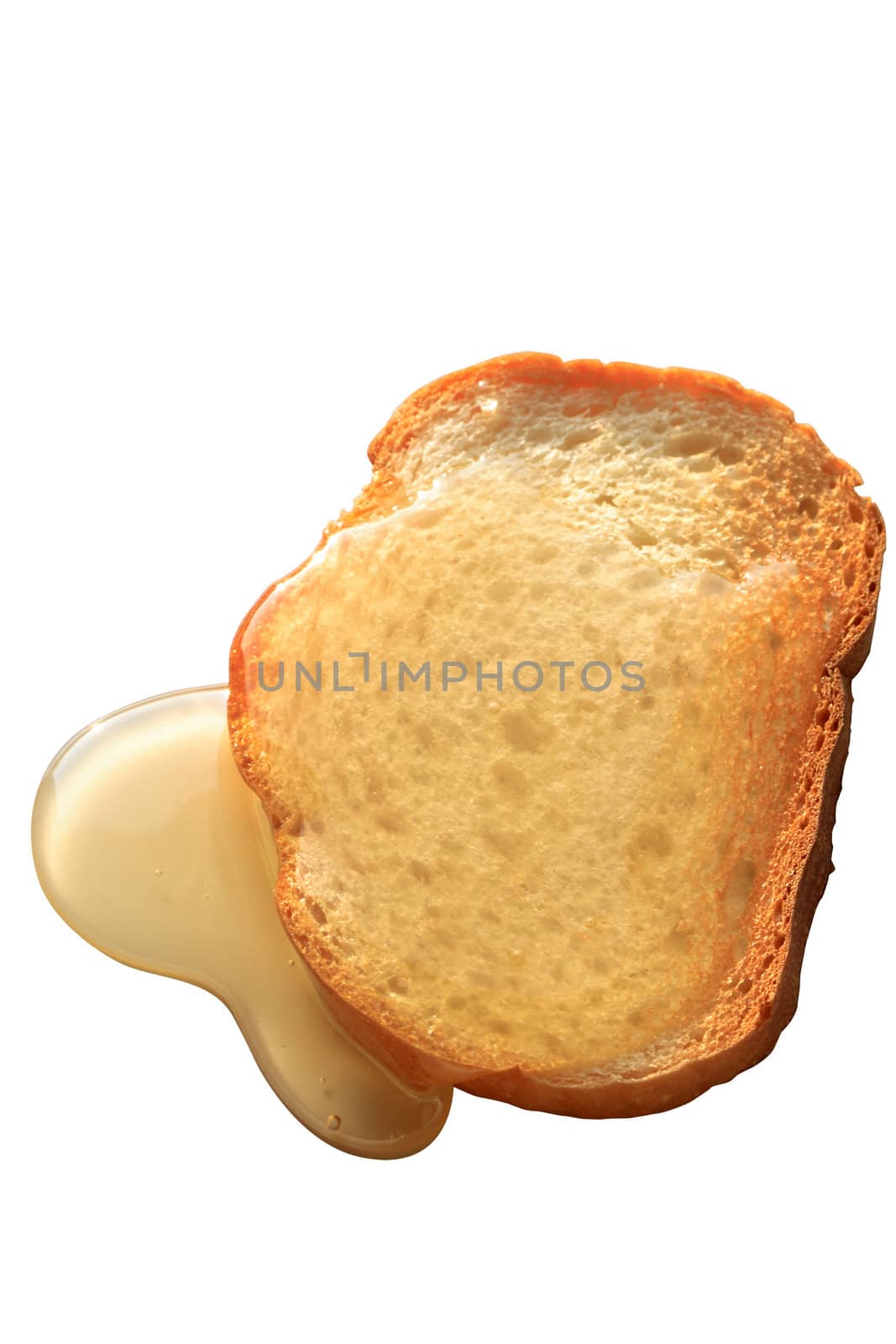 Toast with honey isolated on white background with clipping path