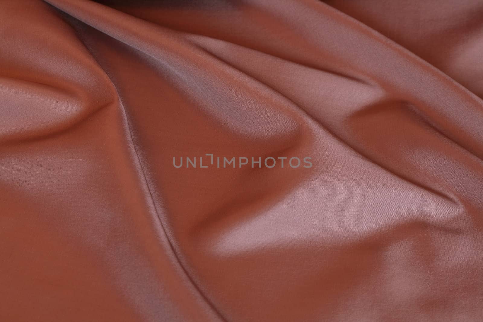 Background made from nice smooth brown textile