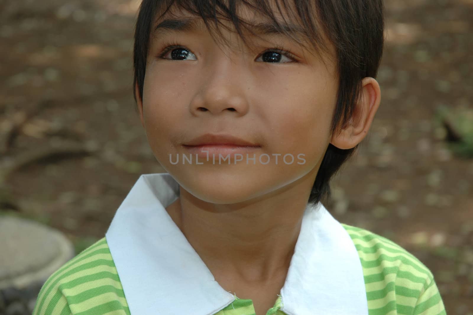 little boy with nice and cute face expression