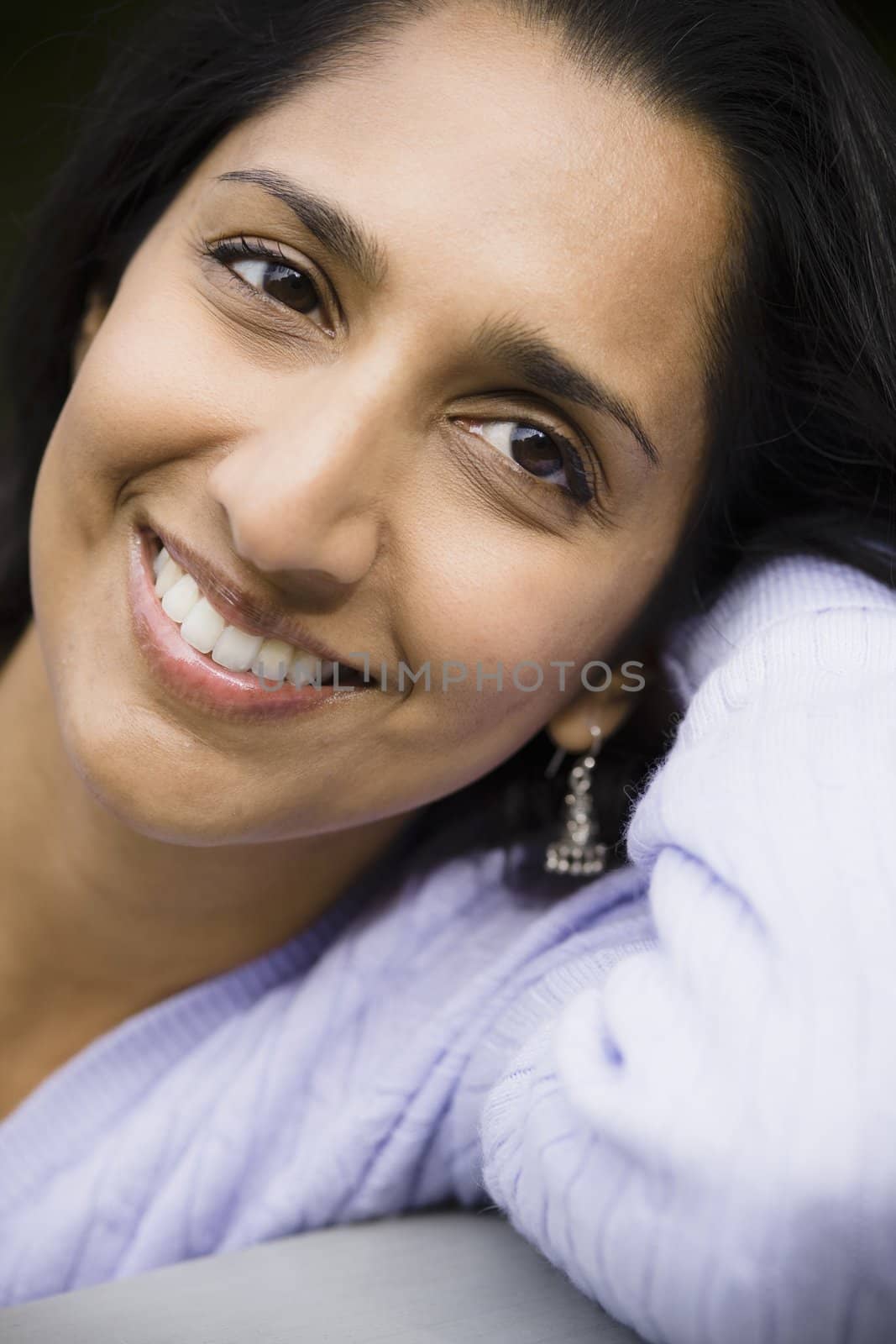 Portrait of a Smiling Indian Woman Outdoors