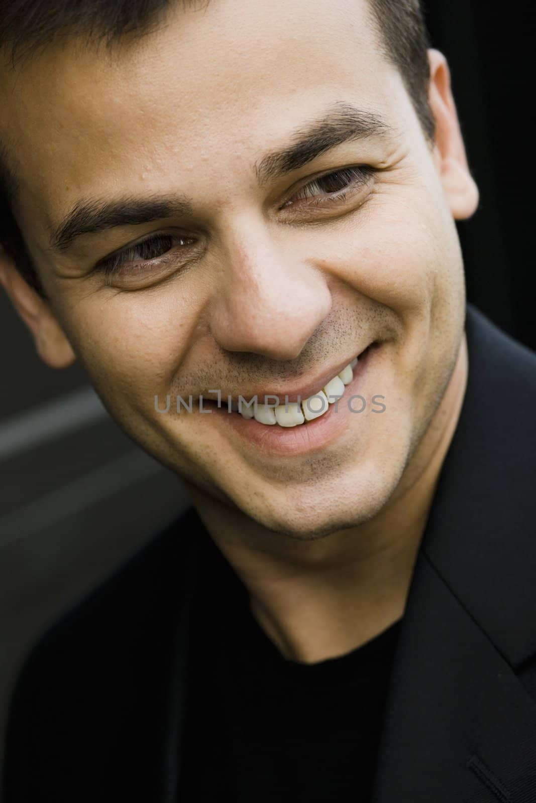 Portrait of a Smiling Indian Male Outdoors