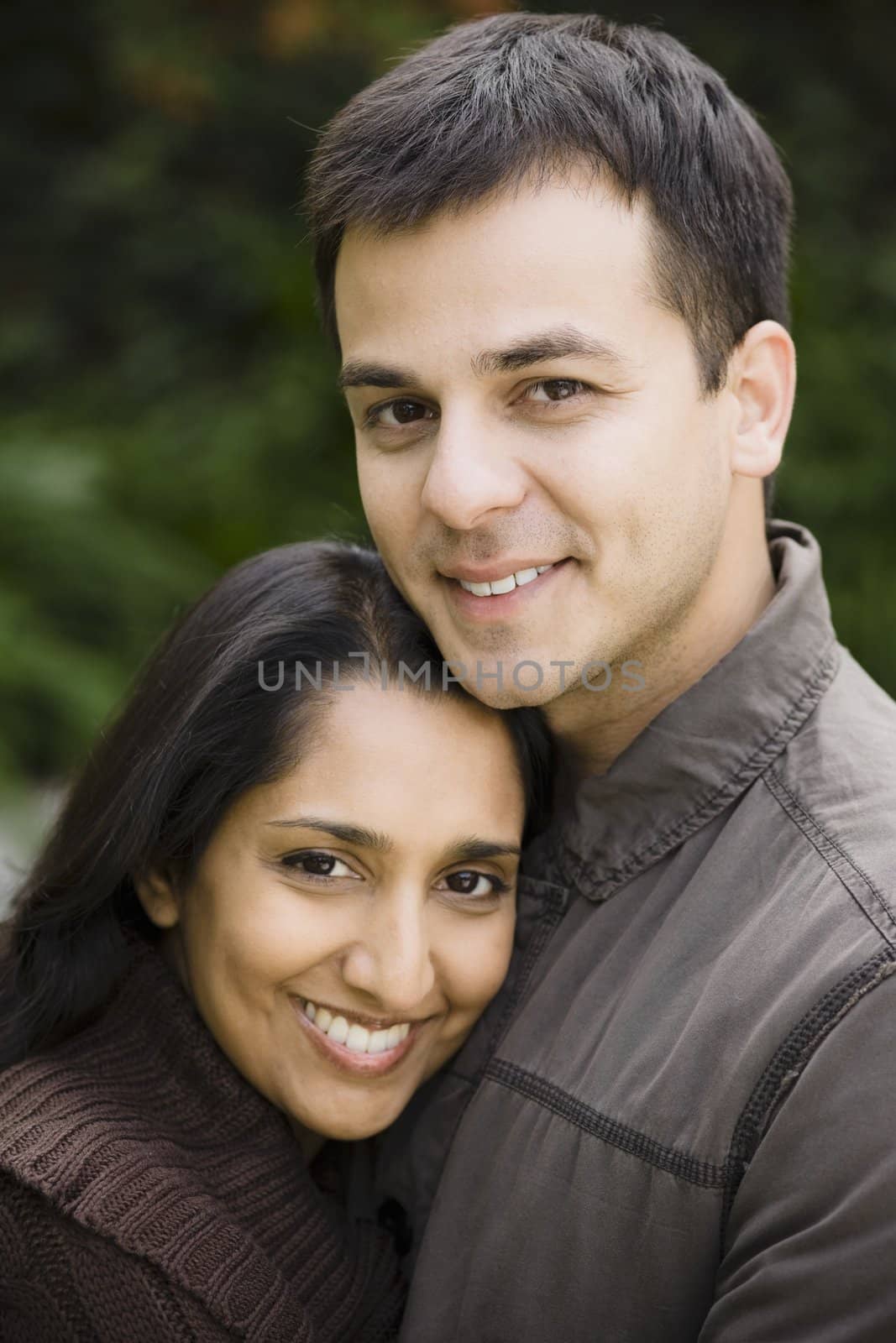 Portrait of a Young Indian Couple Standing Outdoors