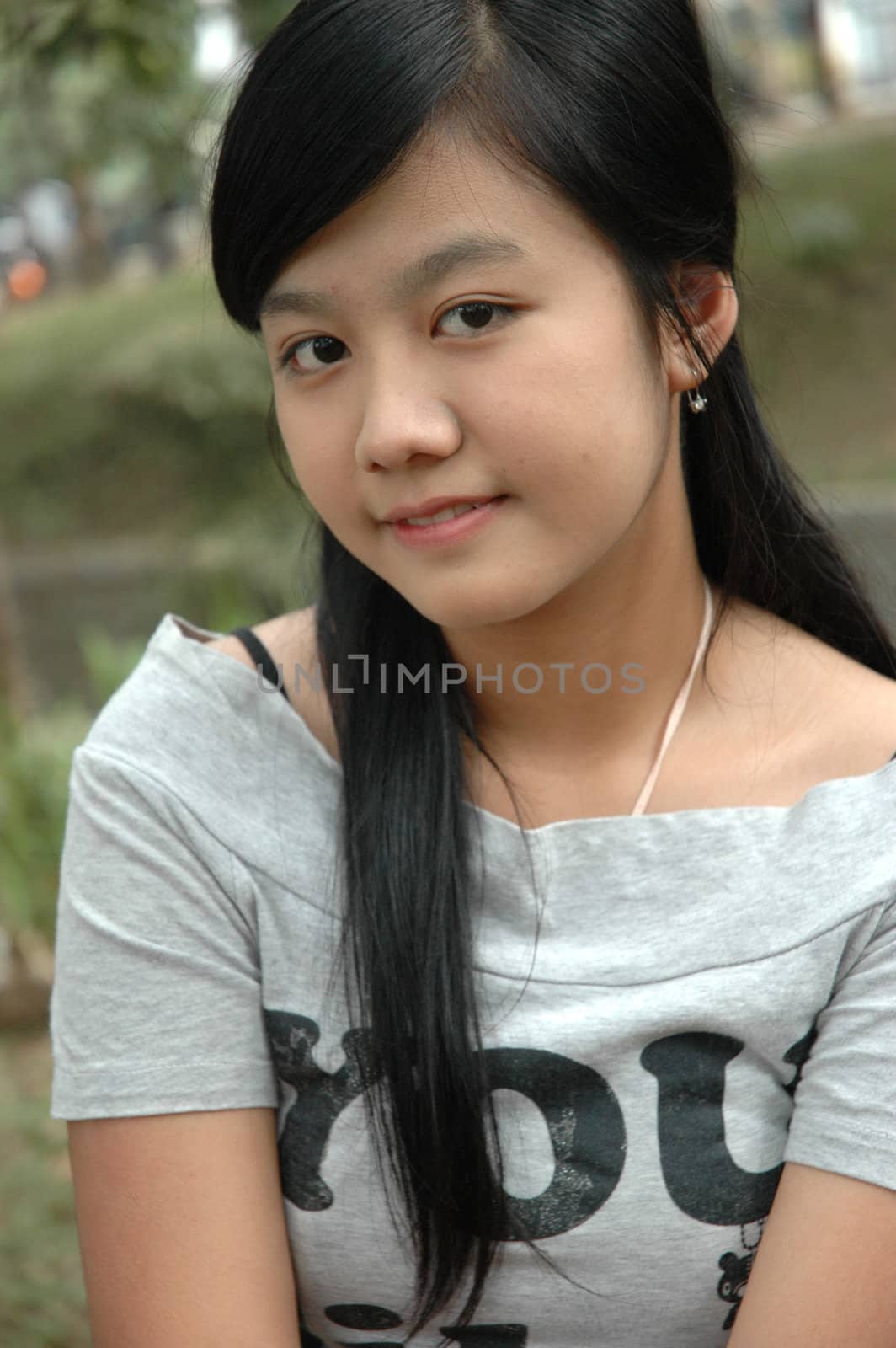 young asian lady with nice smile expression