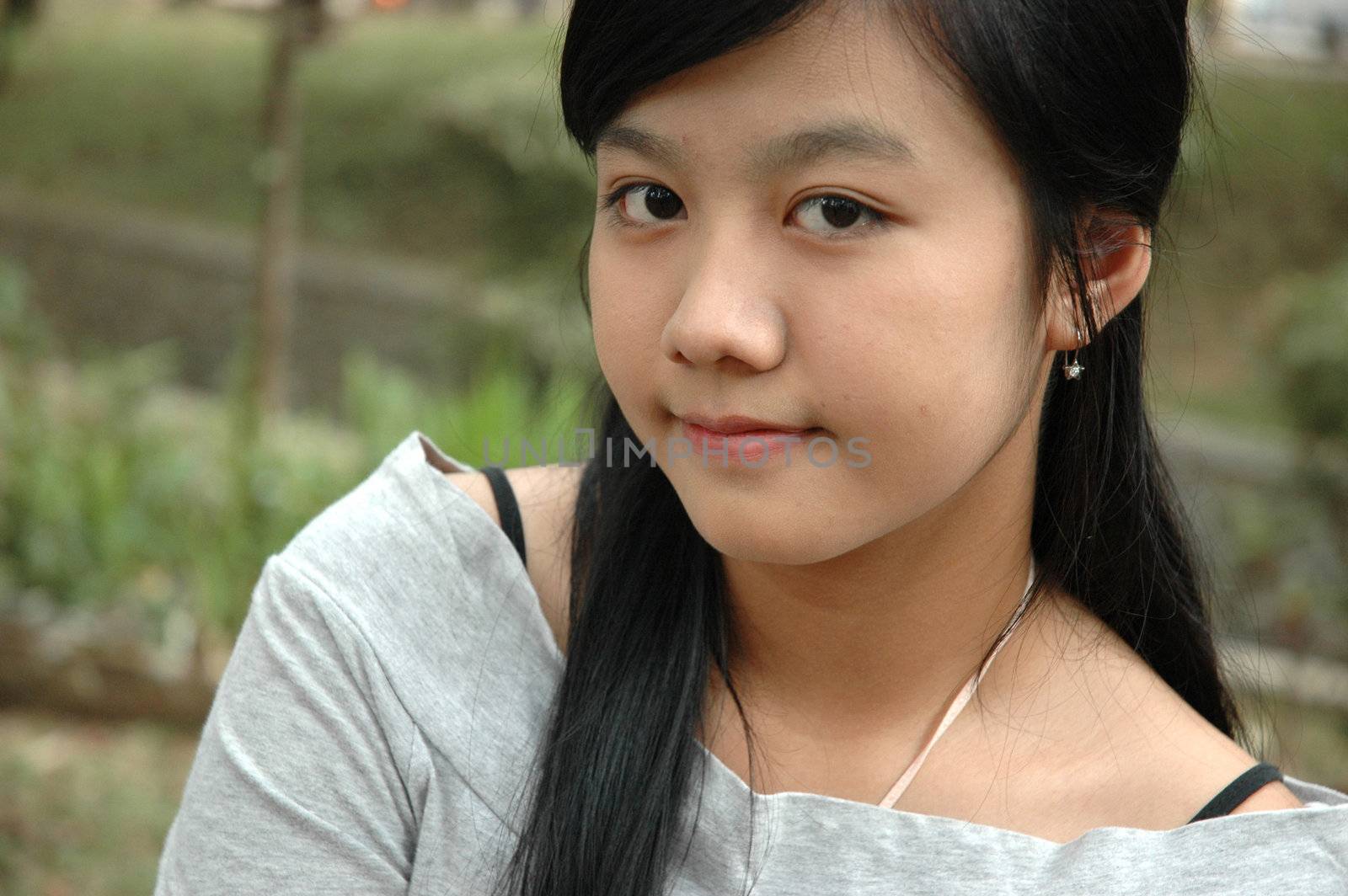 young asian lady with nice smile expression