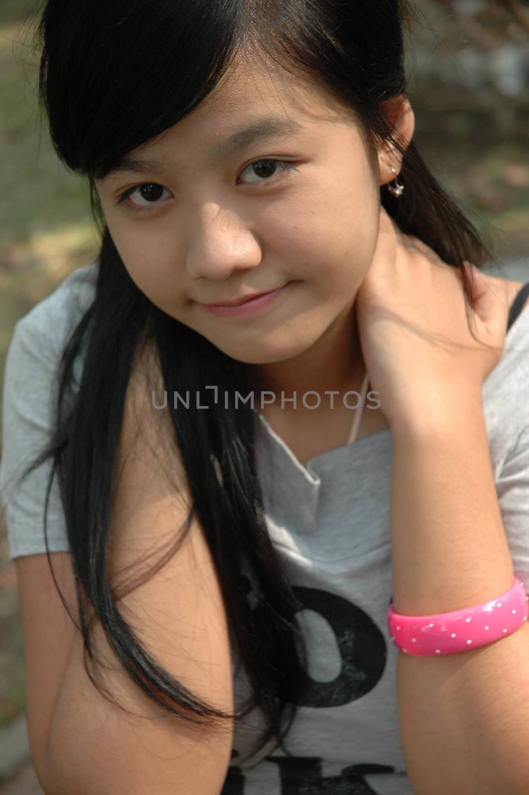 young asian lady with nice smile expression