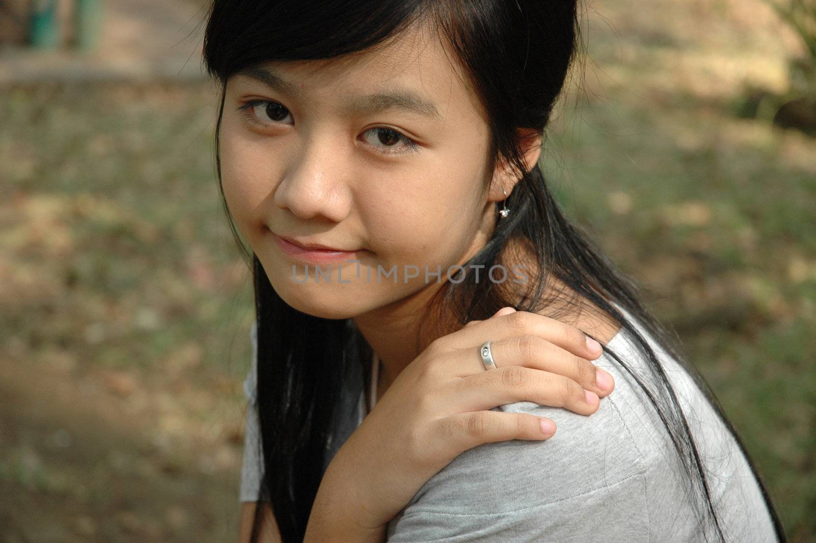 young asian lady with nice smile expression