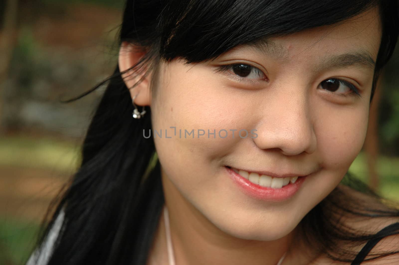 young asian lady with nice smile expression