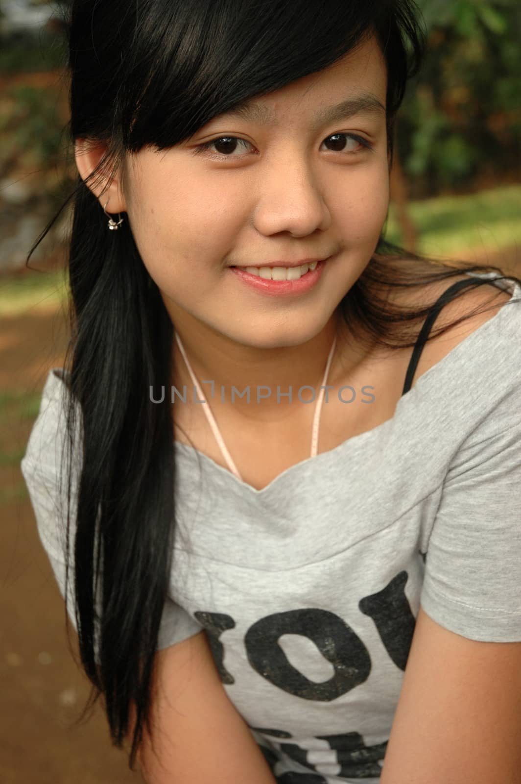 young asian lady with nice smile expression