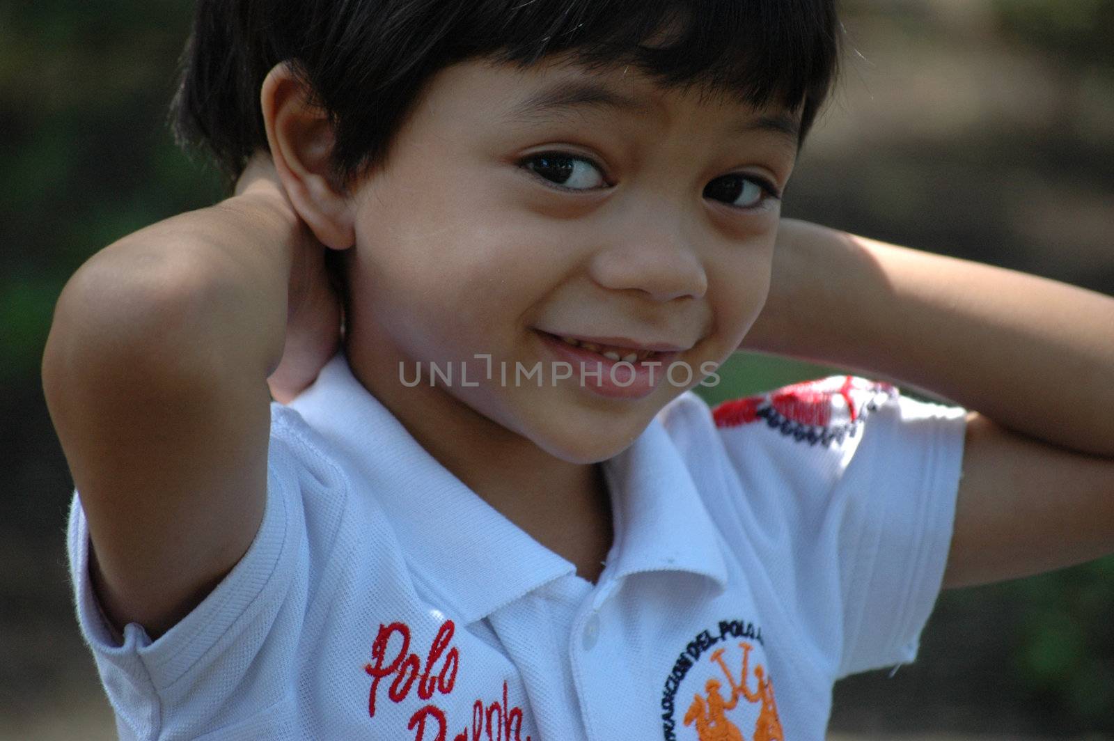 little boy with nice and cute face expression