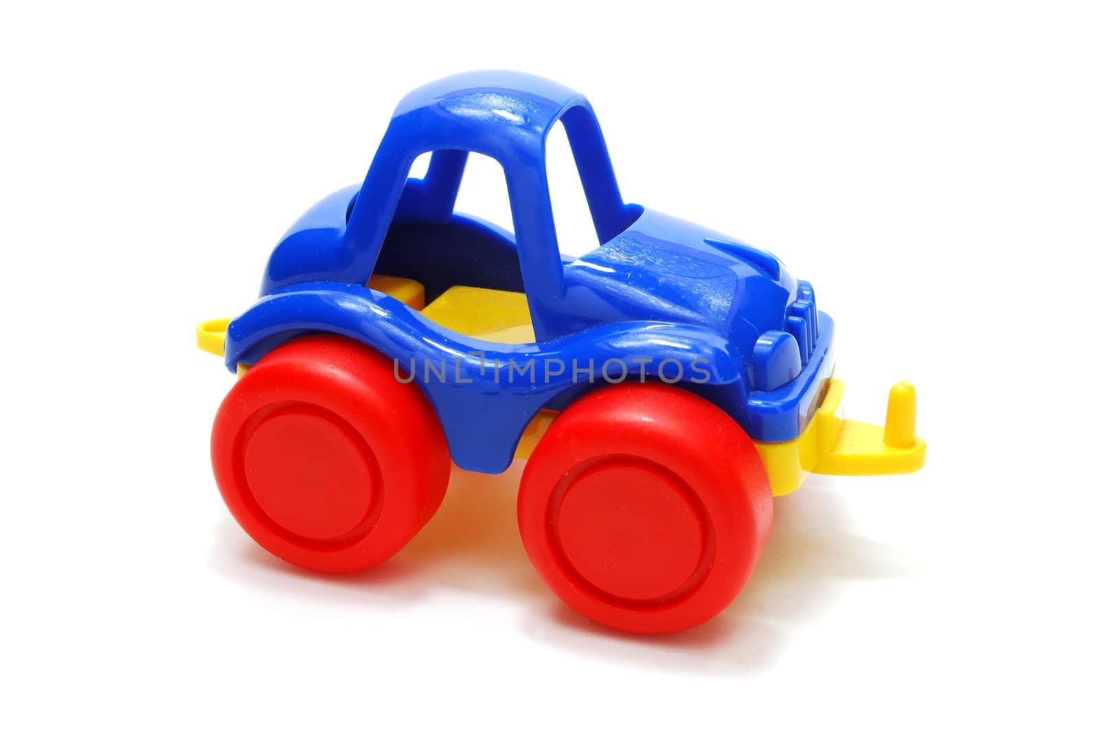 Small Color Plastic Car Toy Isolated on White with Shadow