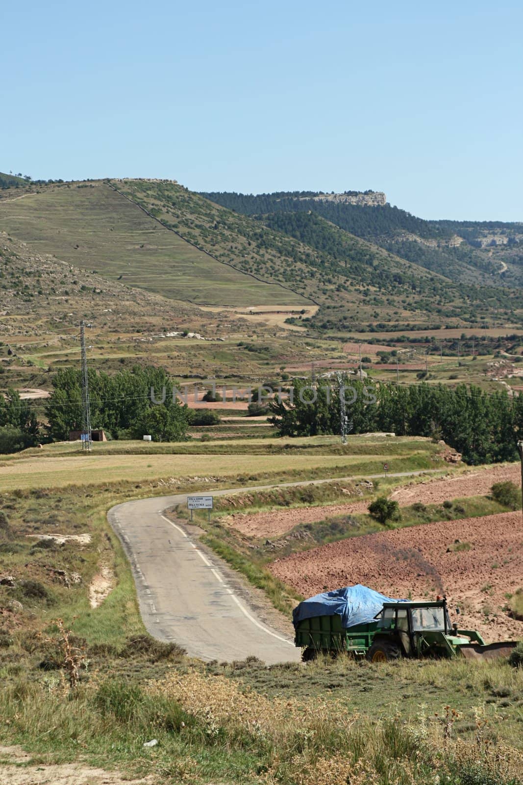 Old woodcutting tractor in mountains