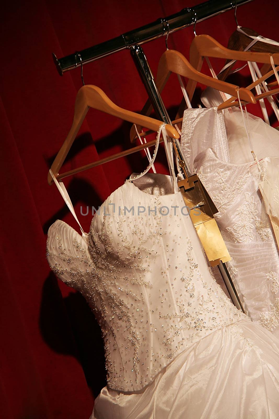 the dress of the bride on a hanger