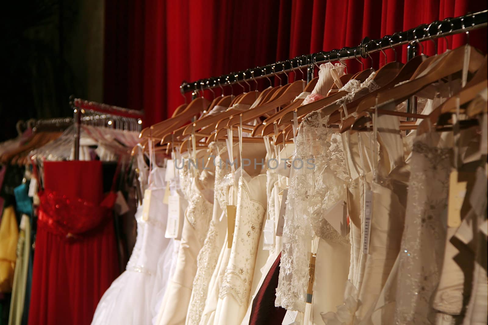 the dress of the bride on a hanger