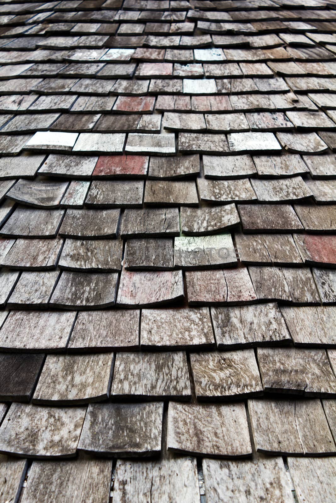 old worn shingle roof pattern in thailand