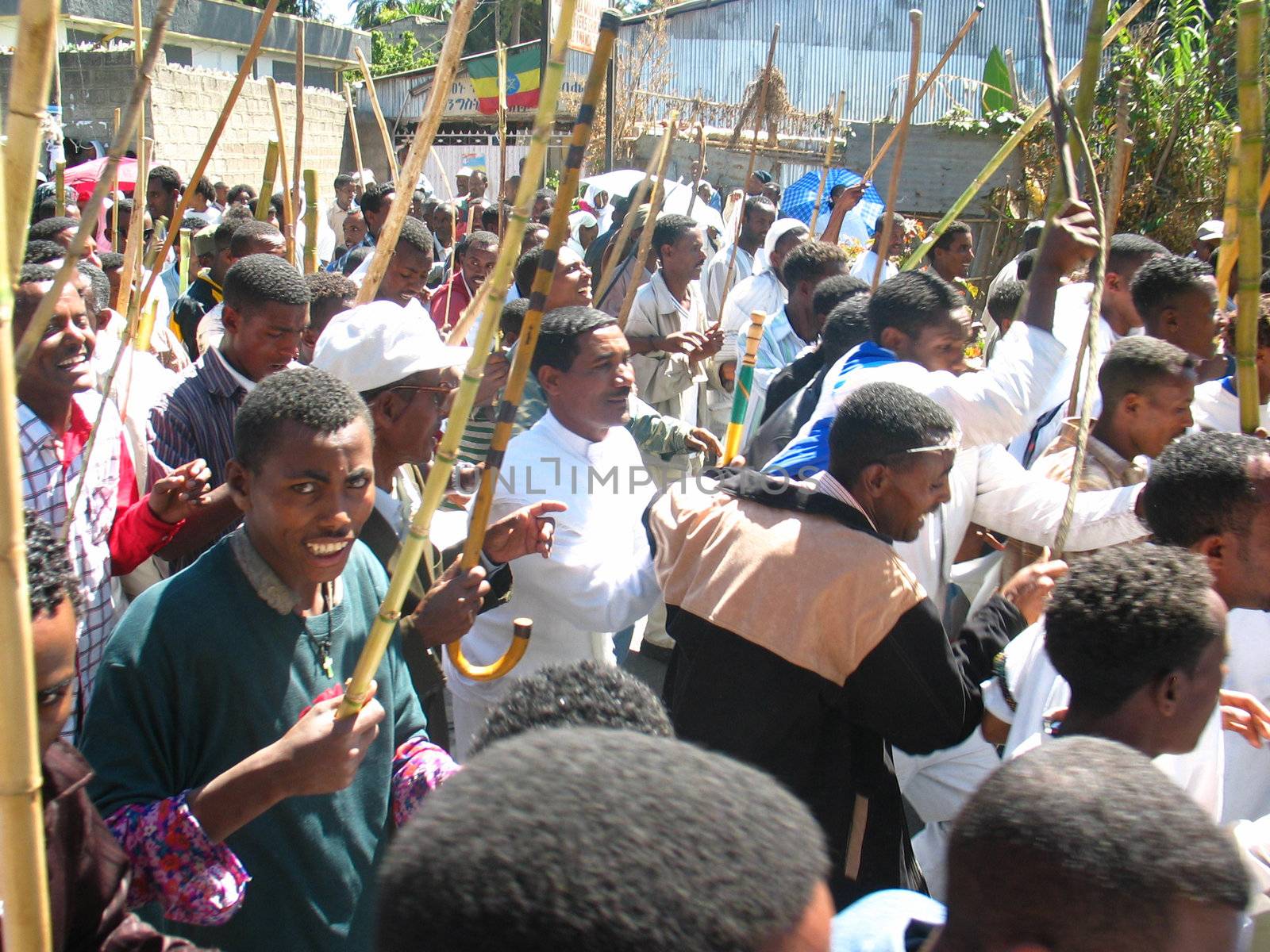 A large crowd singing and chanting while accompanying the Tabot (model of the arc of covenant) of St Michael church during Timket (baptism in Amharic) celebrations - The baptism of Jesus (Taken on January 21, 2008)