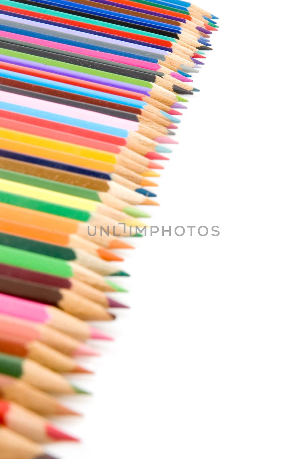 colorful pencils isolated on a white background by ladyminnie