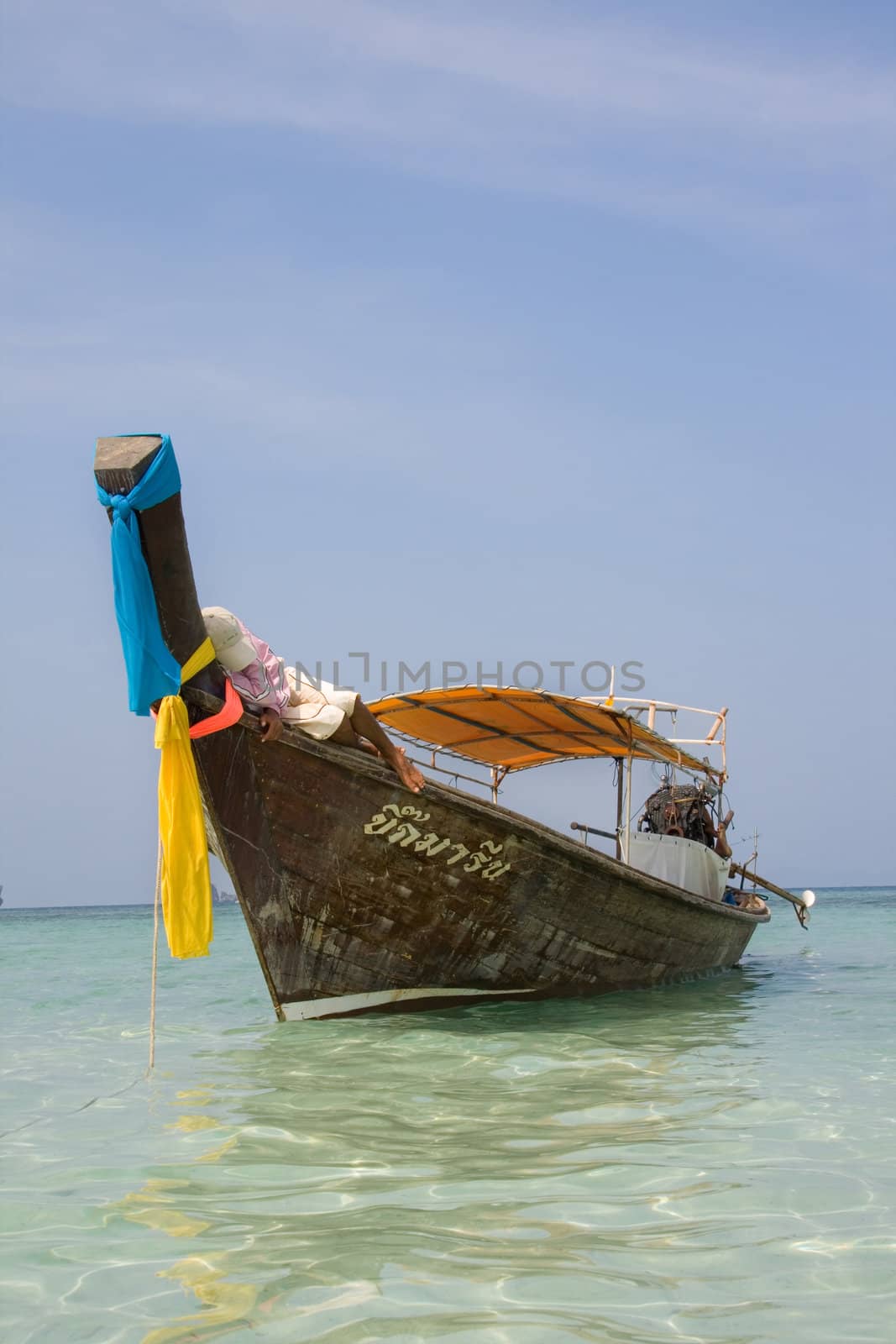 Longtailboat at the beach  by kjorgen