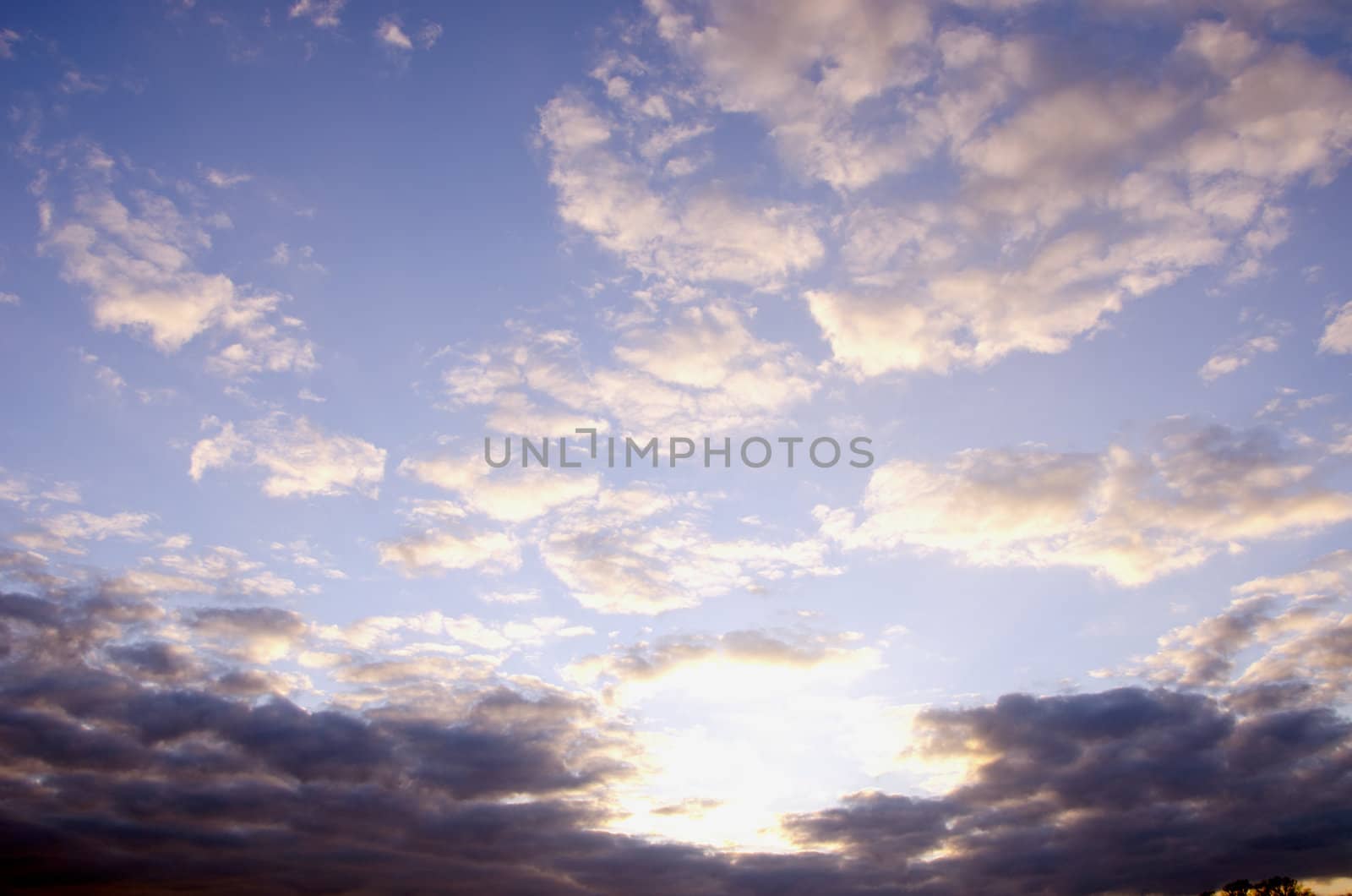 Sunny morning sky full of clouds. by sauletas