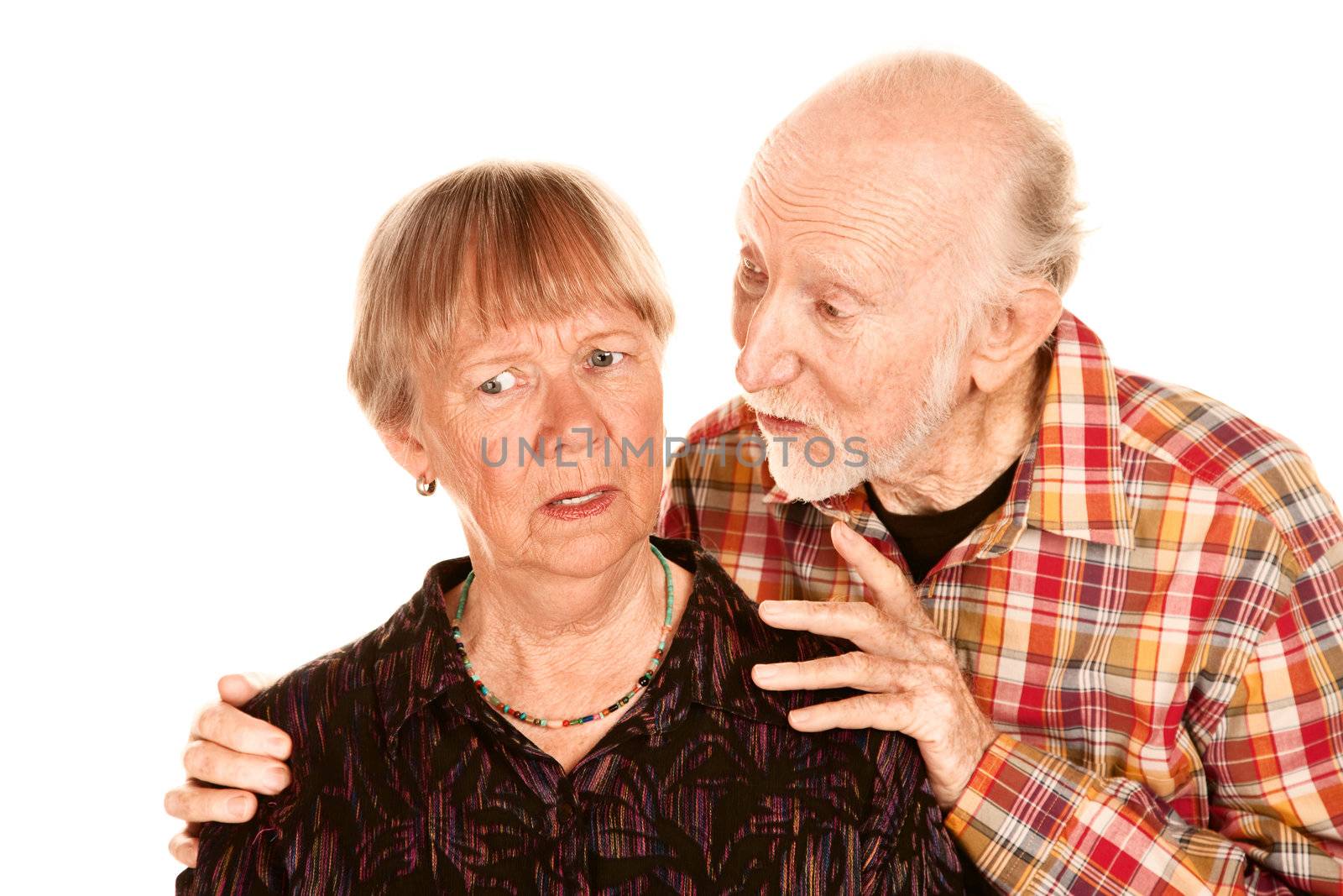 Handsome senior man sharing information with his concerned wife