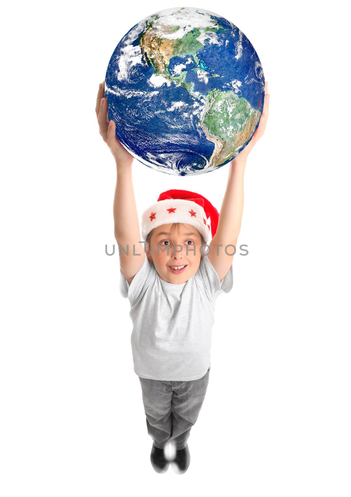 A smiling joyous boy holding our planet Earth with two hands above his head.  Concept