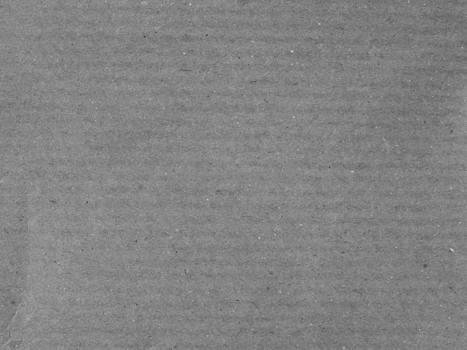 Brown corrugated cardboard sheet useful as a background