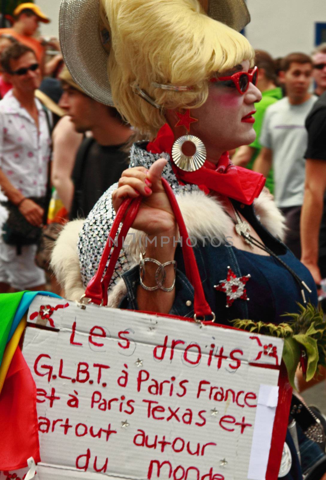 PARIS - JUNE 27: A participant with a direct message in the annual Marche des Fiertes (Gay Pride parade) June 27, 2009 in Paris, France. En route from Montparnasse to Bastille, this year’s event attracted half a million spectators and participants, including guest celebrity Lisa Minelli.