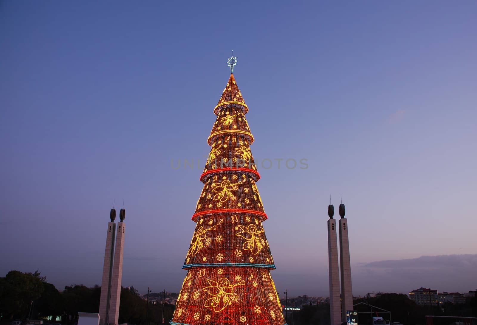 Beautiful tall Christmas tree in Lisbon (at sunset) by luissantos84