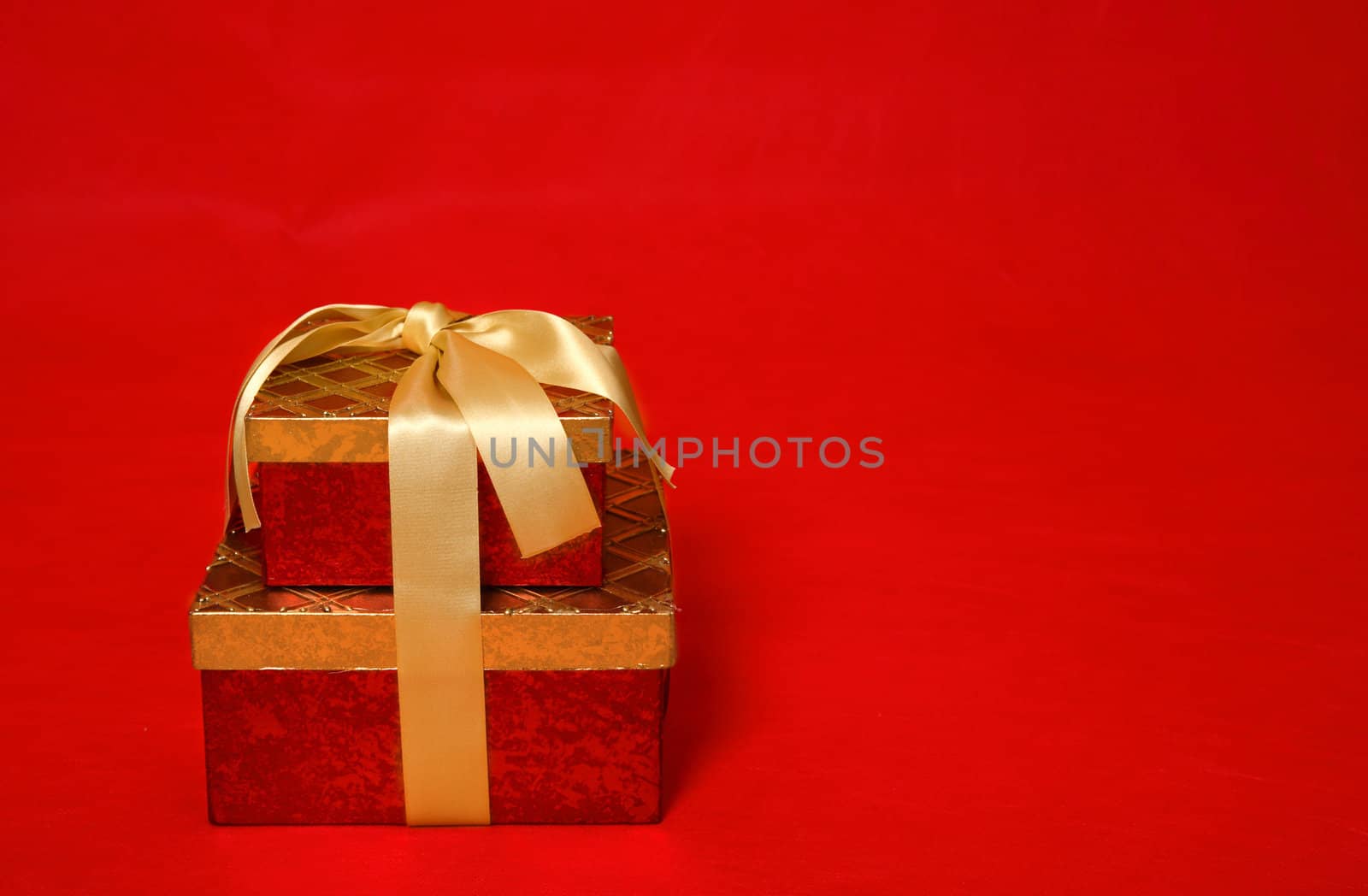 Wrapped present on a red background by lovleah