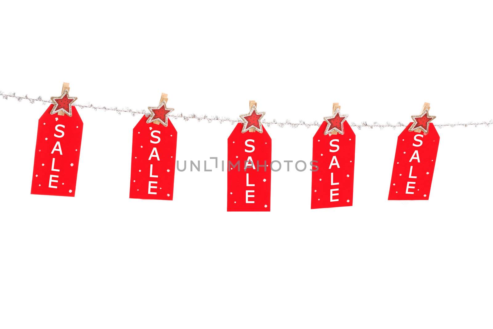 Pre or post Christmas sale -  tags on a silver glitter string line with fancy pegs with stars.  Or change it to add your own text
