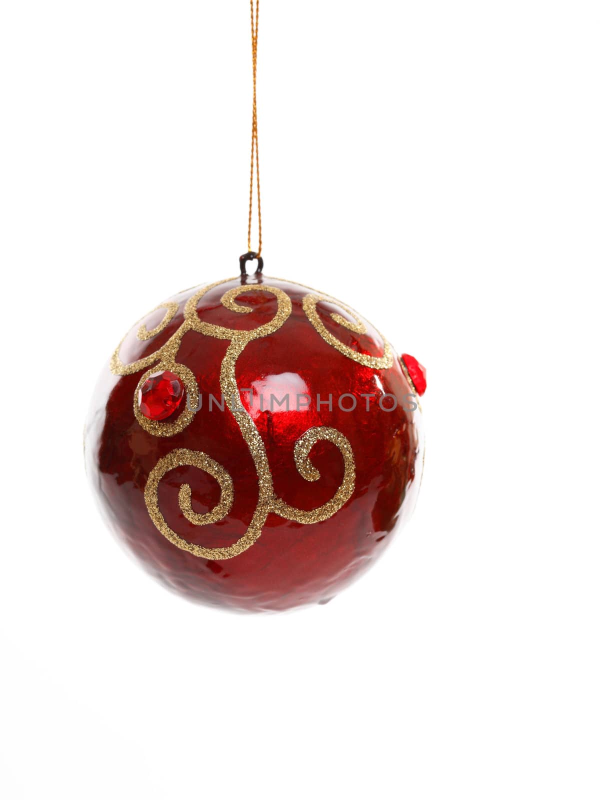 Red Christmas ball ornament decorated with beads and gold glitter swirls.