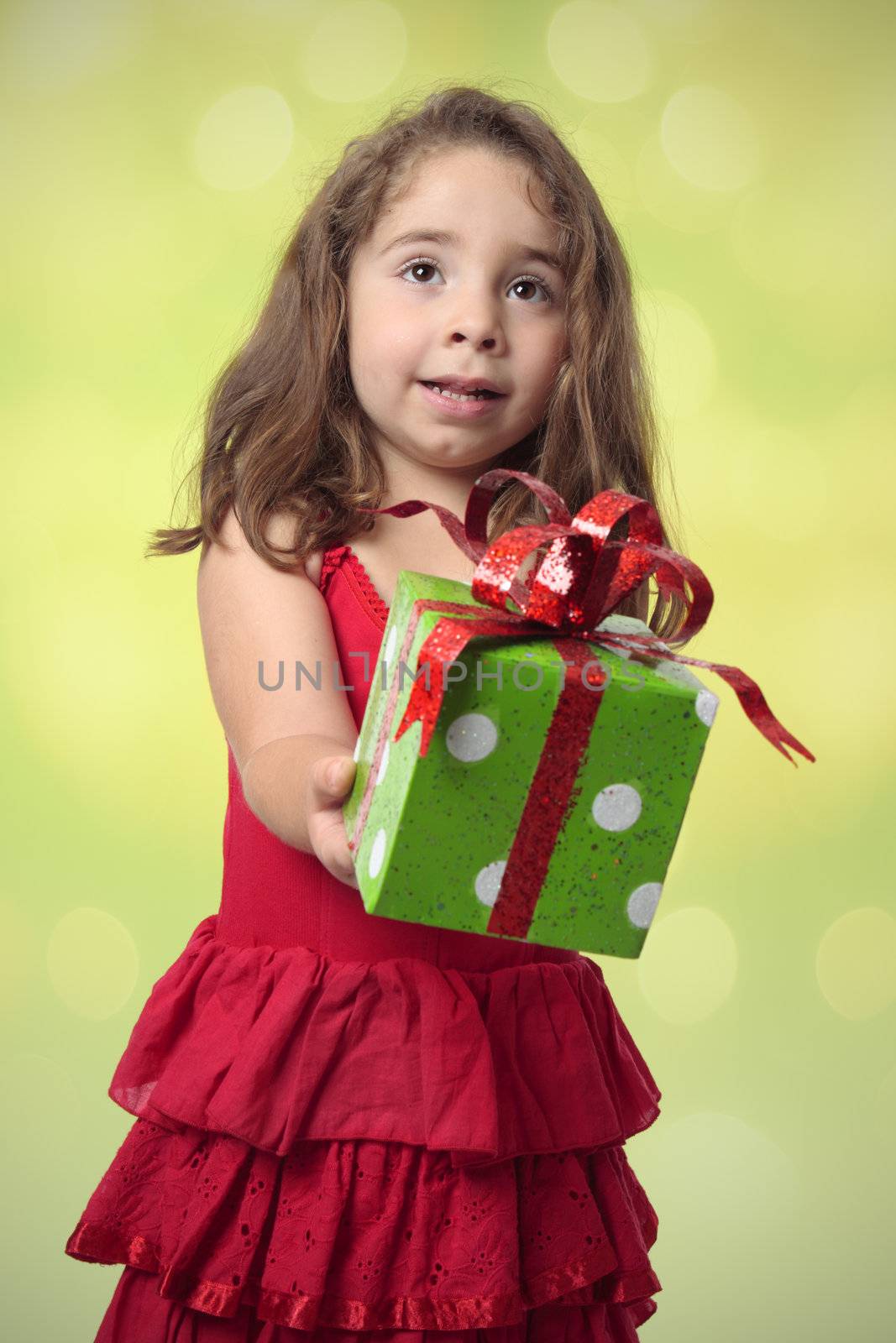 Pretty girl giving present by lovleah