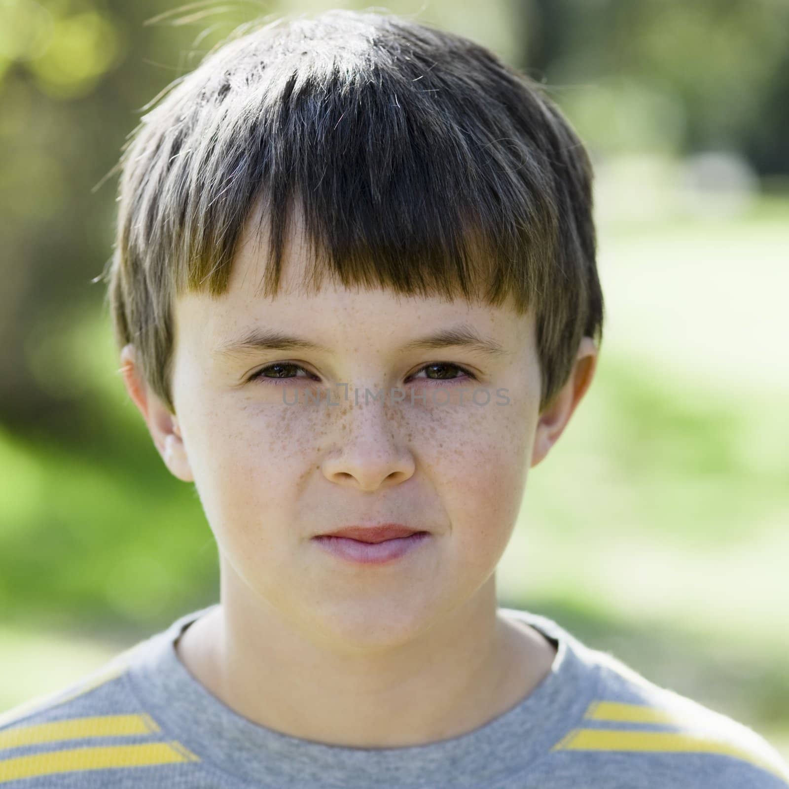 Portrait of a Young Boy Sneering To Camera