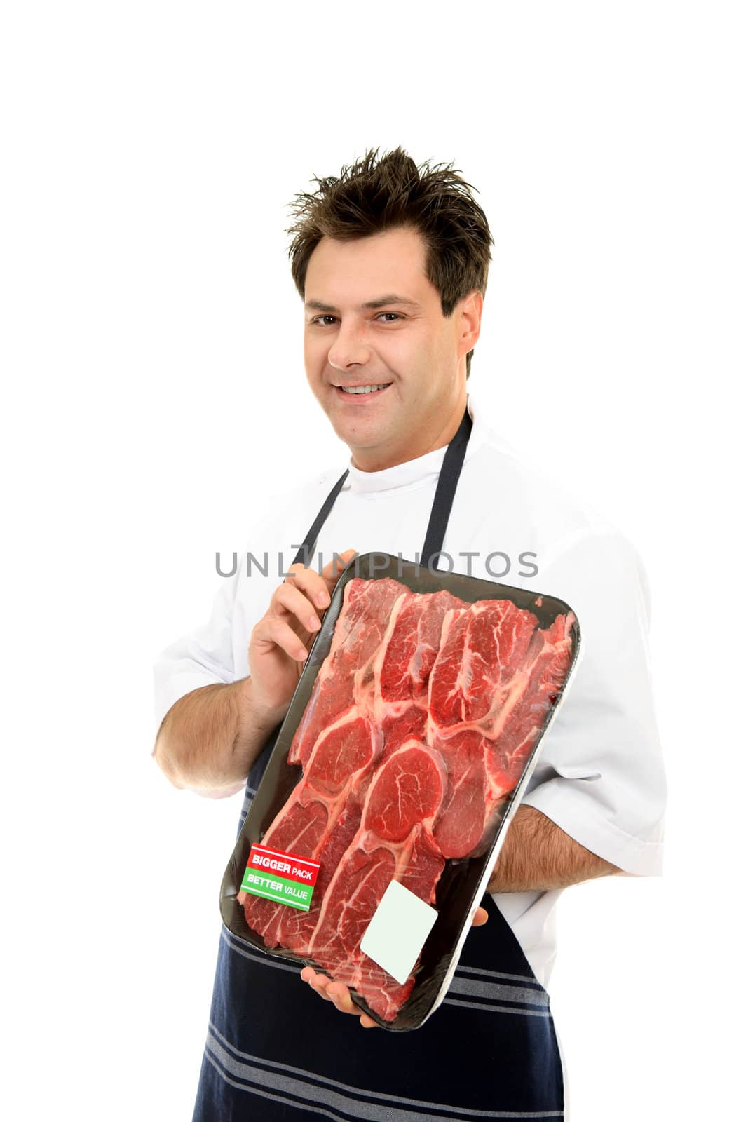 Smiling butcher holding meat tray