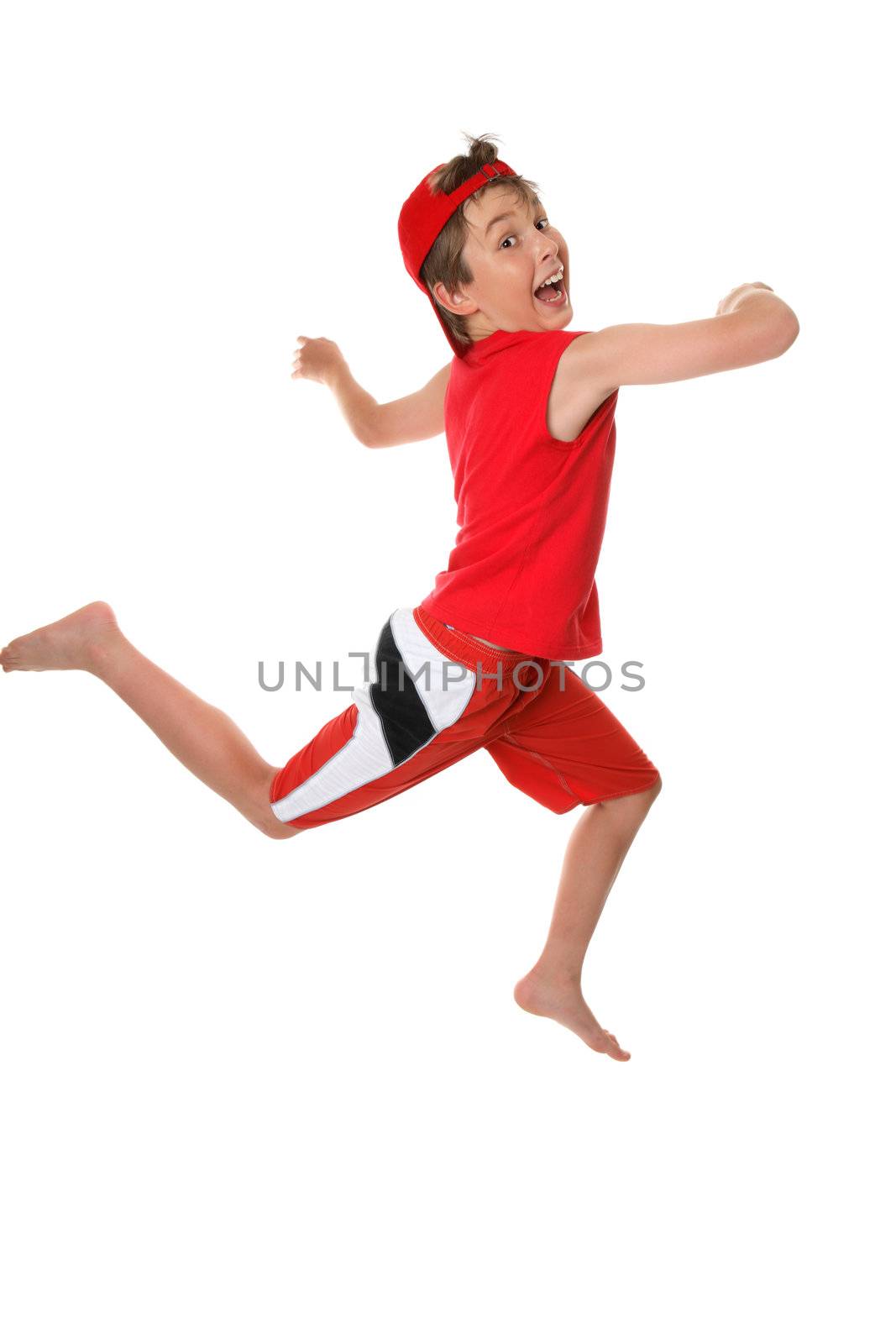 Happy healthy boy leaping or running and having fun