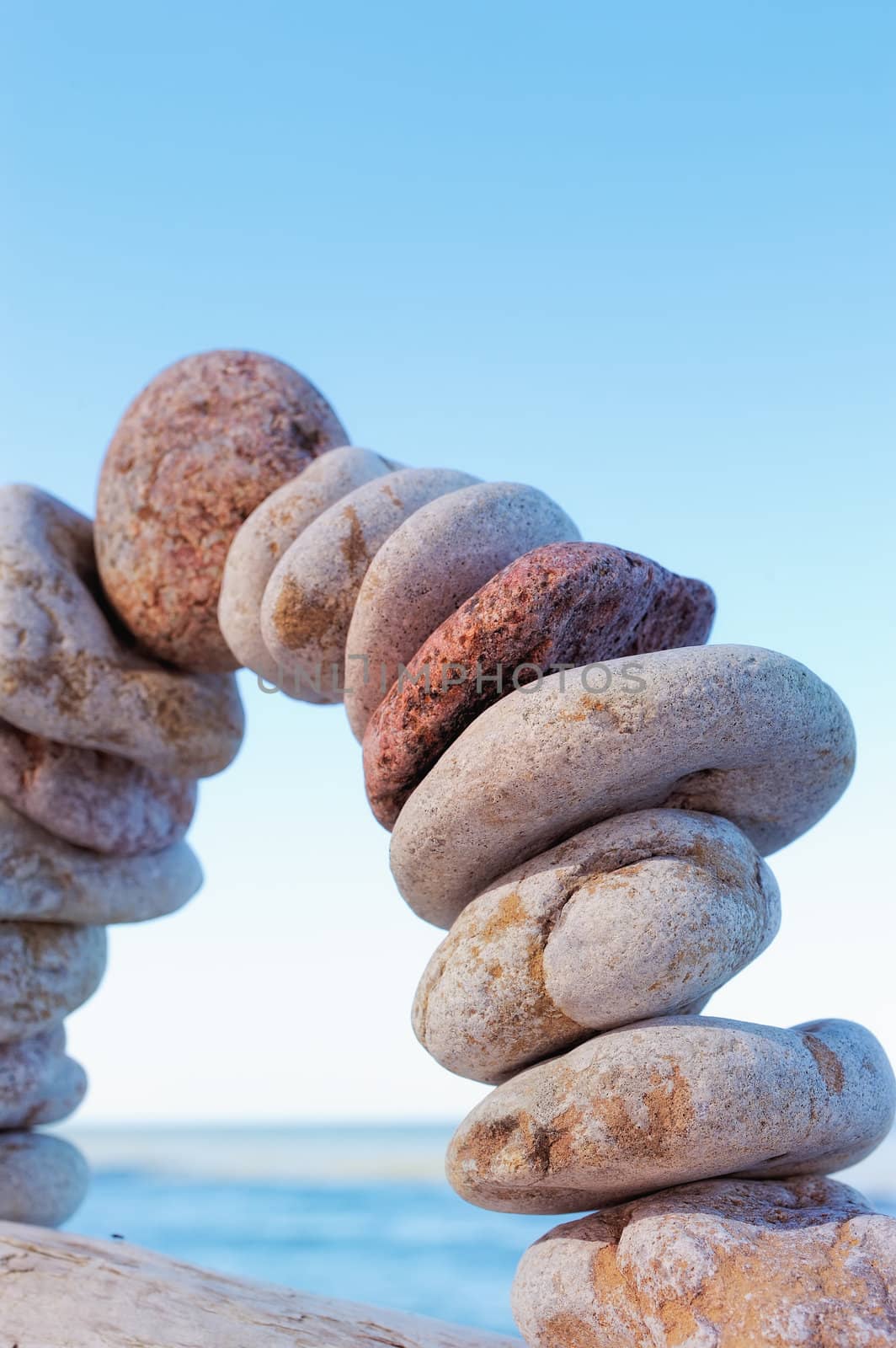 Set of pebbles against the sky curved in an arc