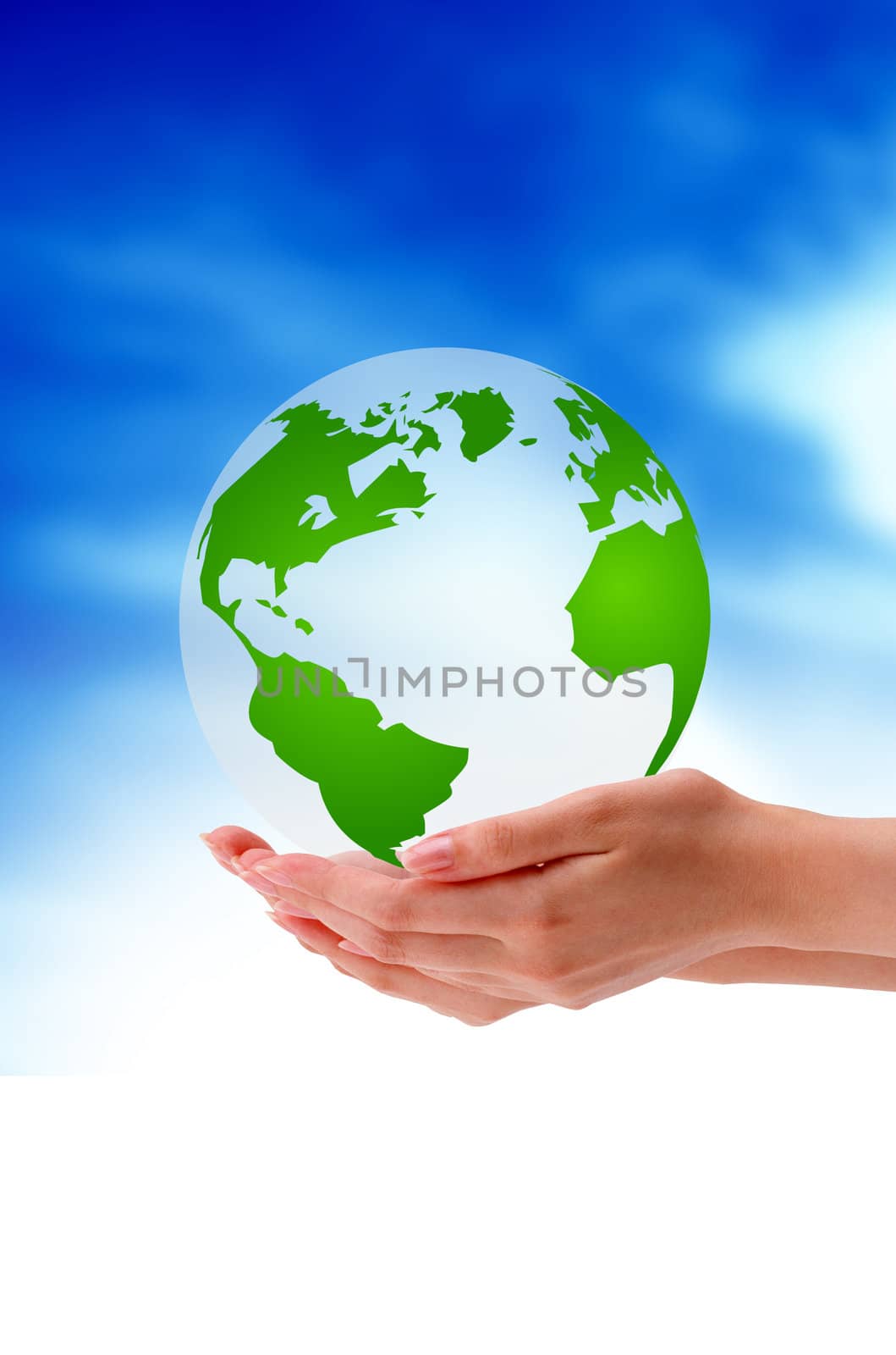 Hand holding a globe on cloud background.