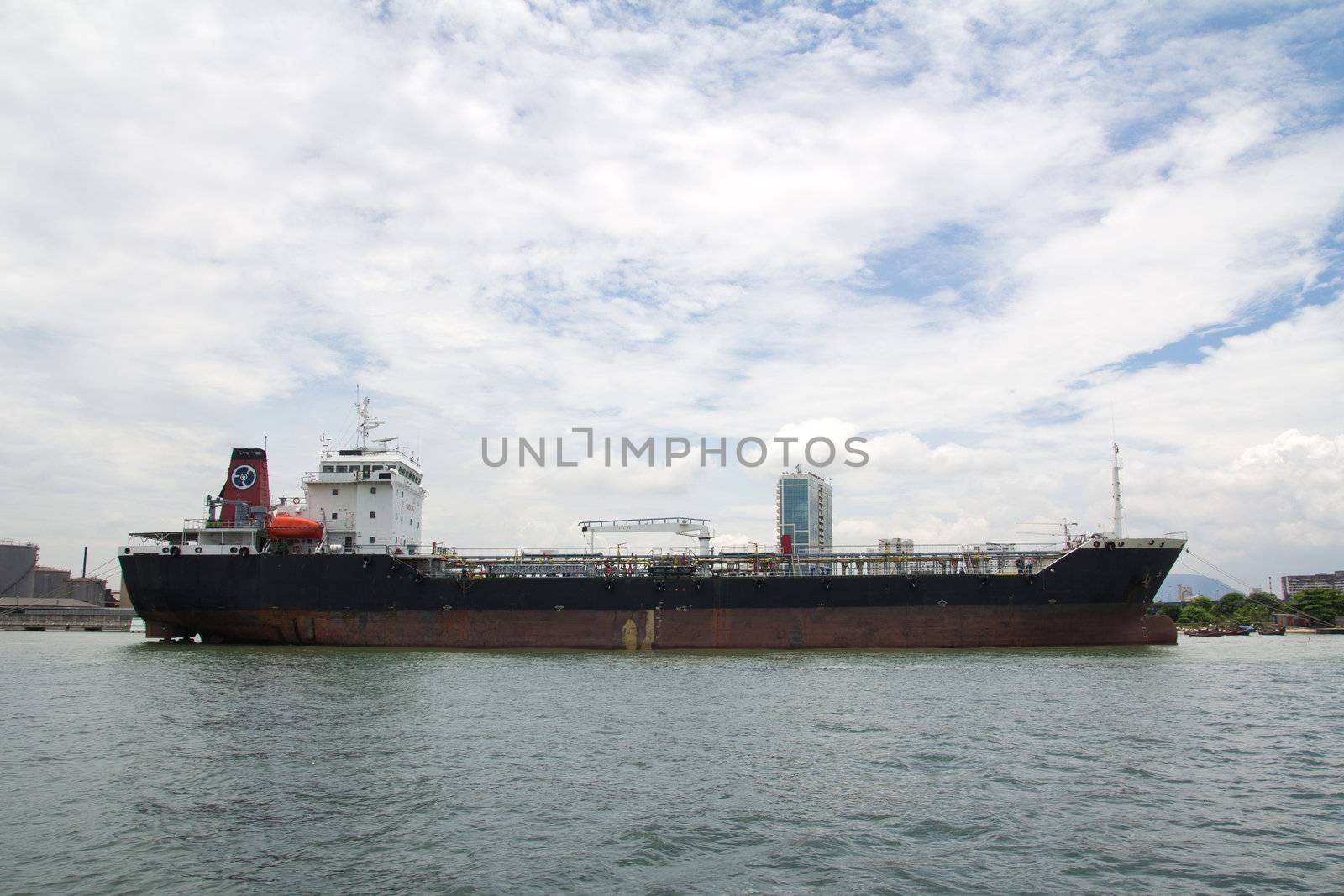 Container ship docked at the harbor