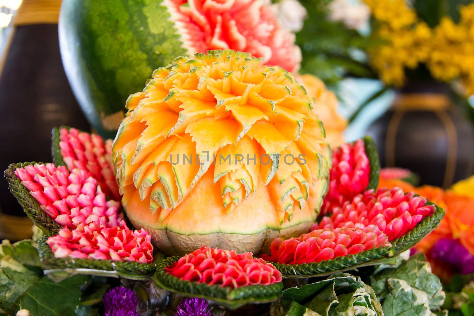 An assortment of fresh carved mix fruits