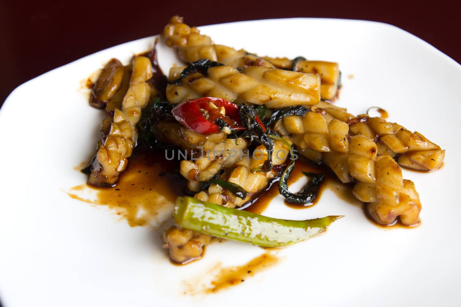 Chinese style chili fry squid with a soya sauce