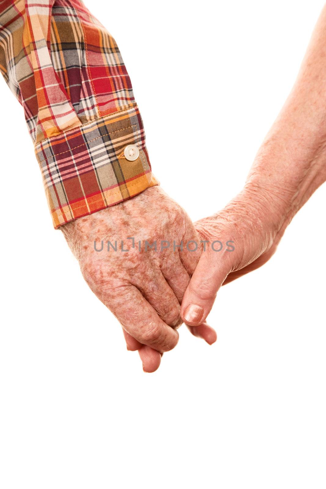 Senior couple holding hands on white bakcground