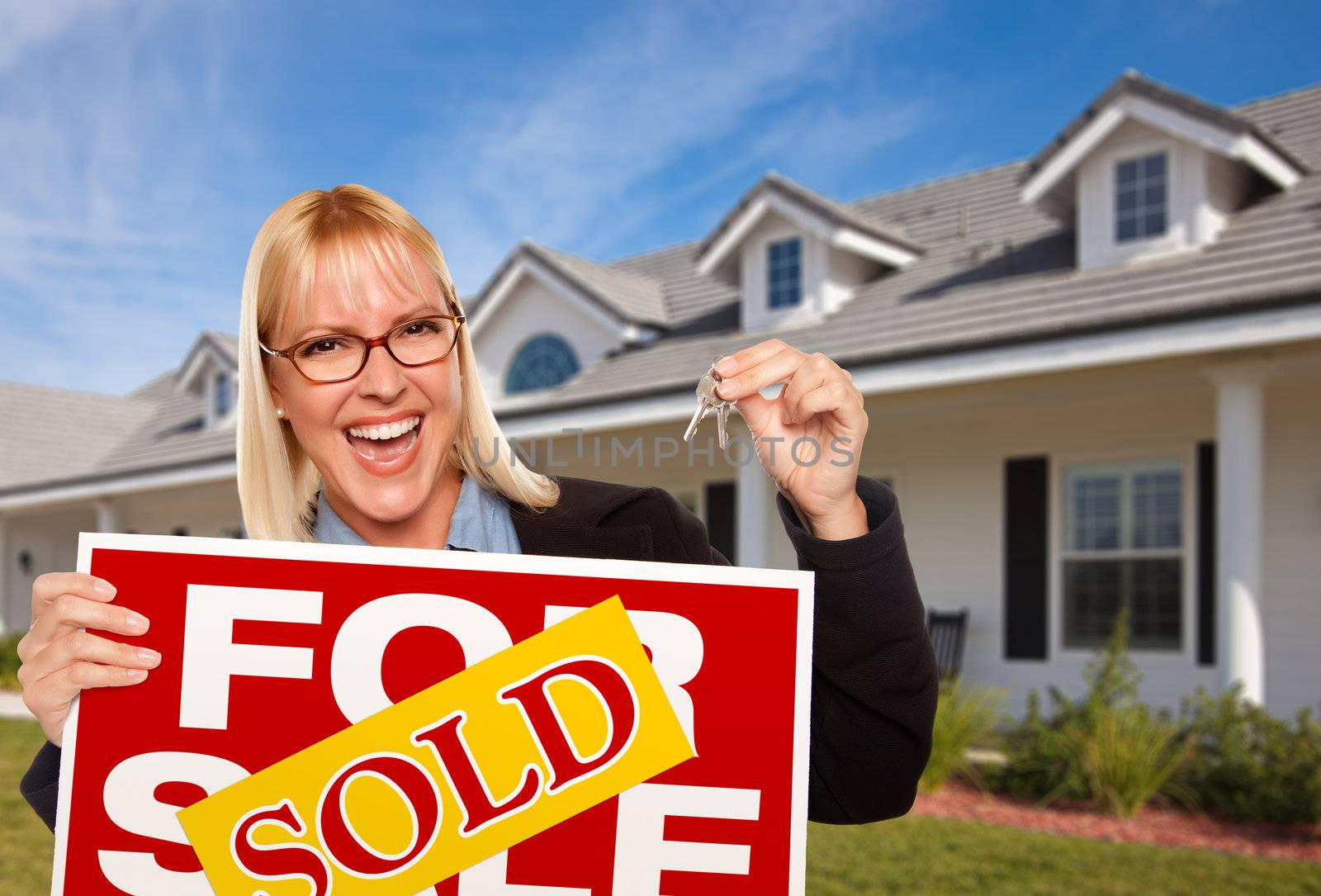 Beautiful Female Holding Keys & Sold Real Estate Sign by Feverpitched