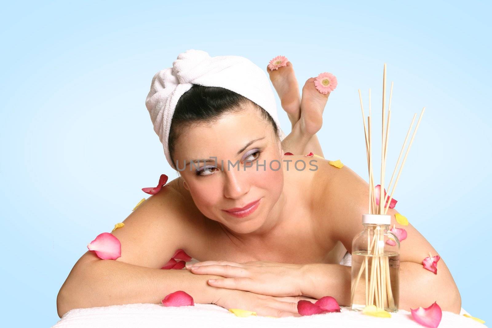A resting woman ready for beauty therapy, massage or aromatherapy treatment