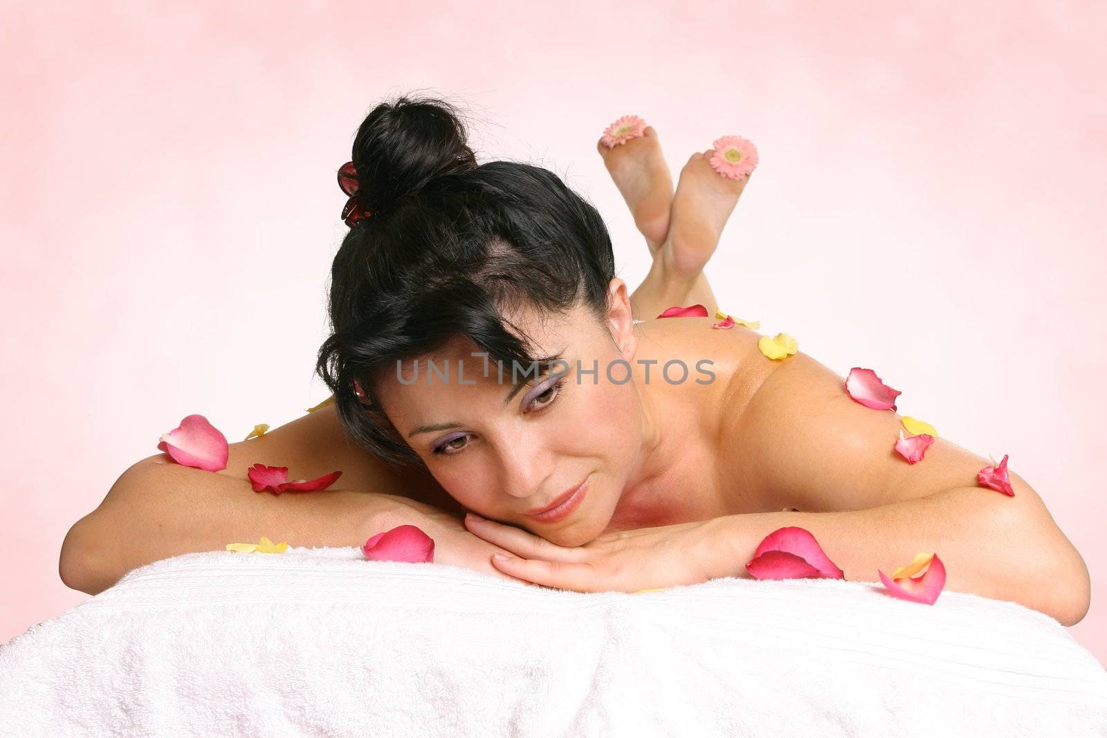 A beautiful woman with peaceful reflections.  Suitable for blissful retreats, holistic services, wellness therapies, beauty rituals, rejuvenation or spa treatments.