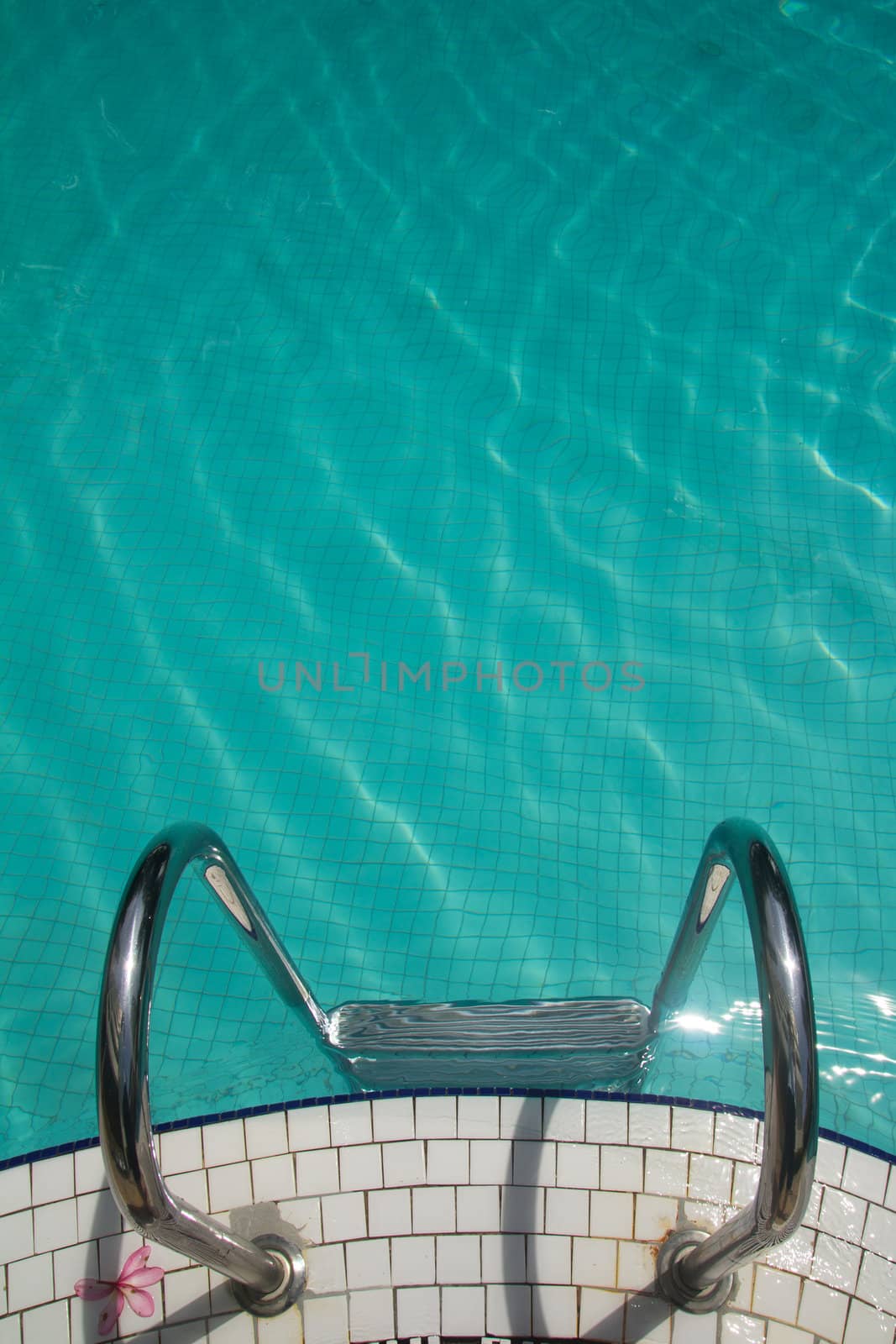 Stainless steel railing in a swimming pool