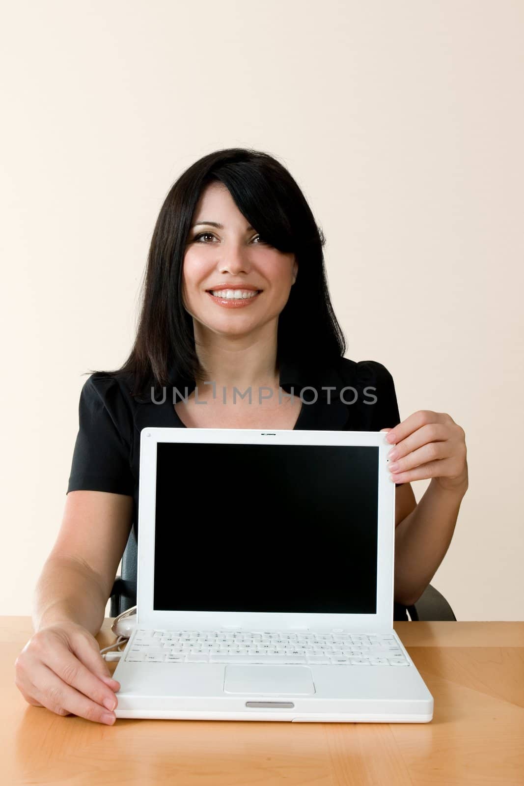 Smiling woman with laptop computer