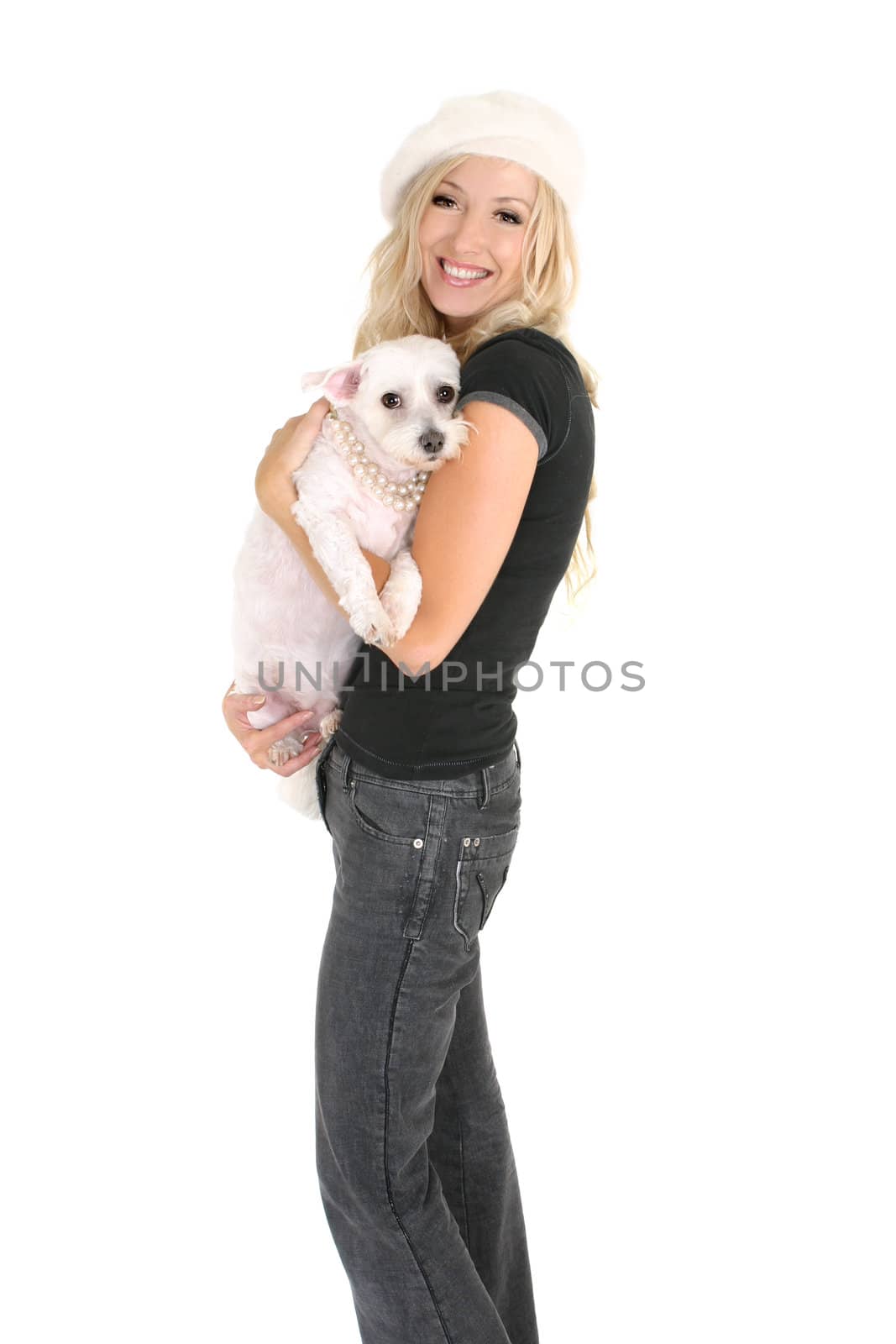 Woman holding a small dog by lovleah