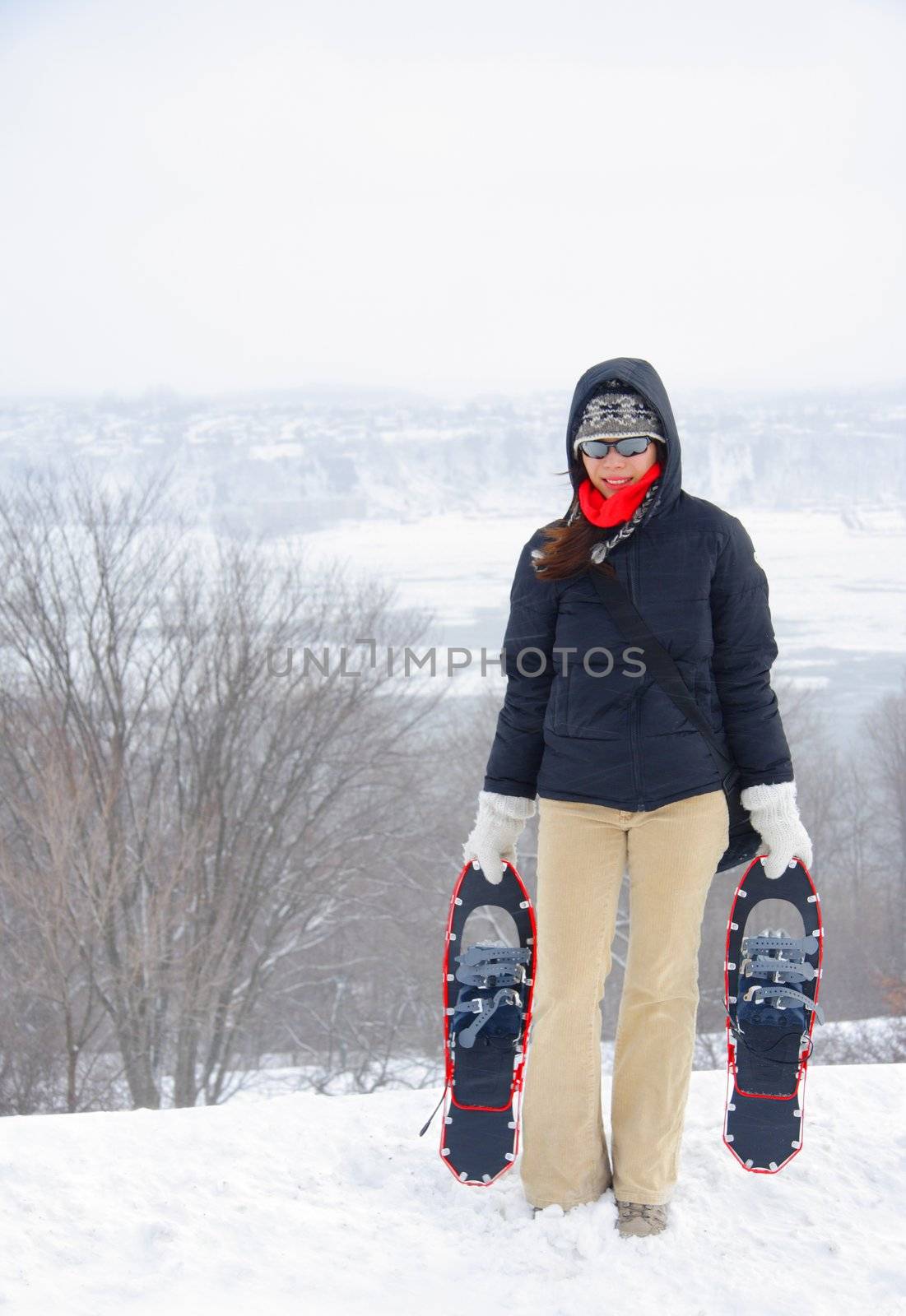 Woman with snowshoes by Maridav