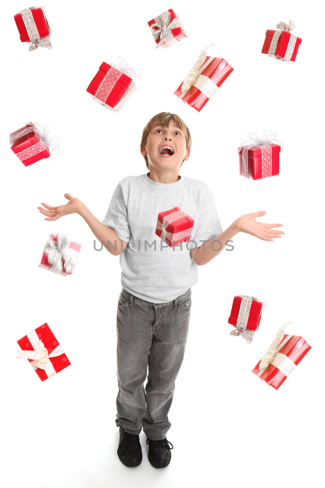 A child in awe at the abundance of gifts fallling around him like rain.