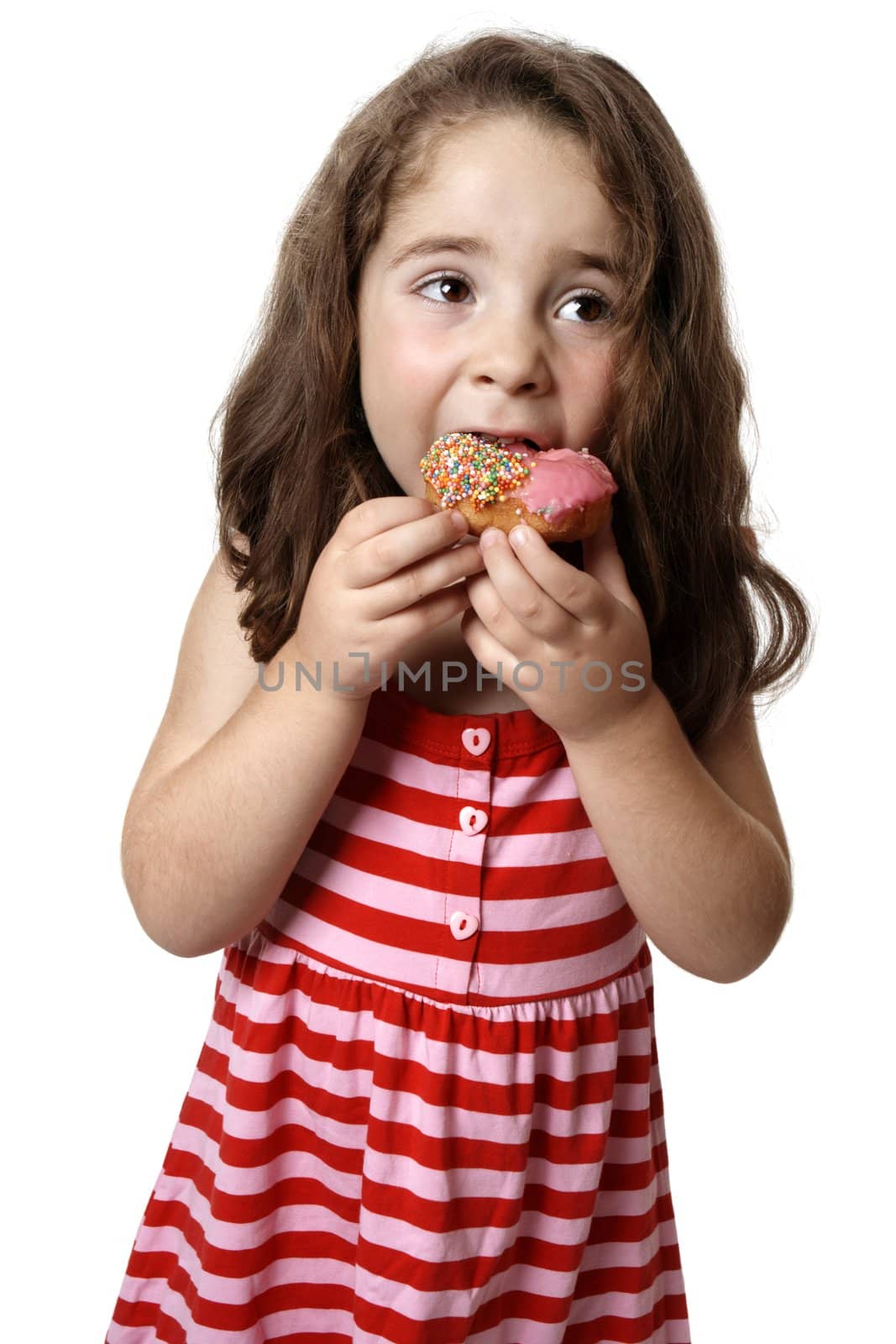 Young girl eating doughnut by lovleah